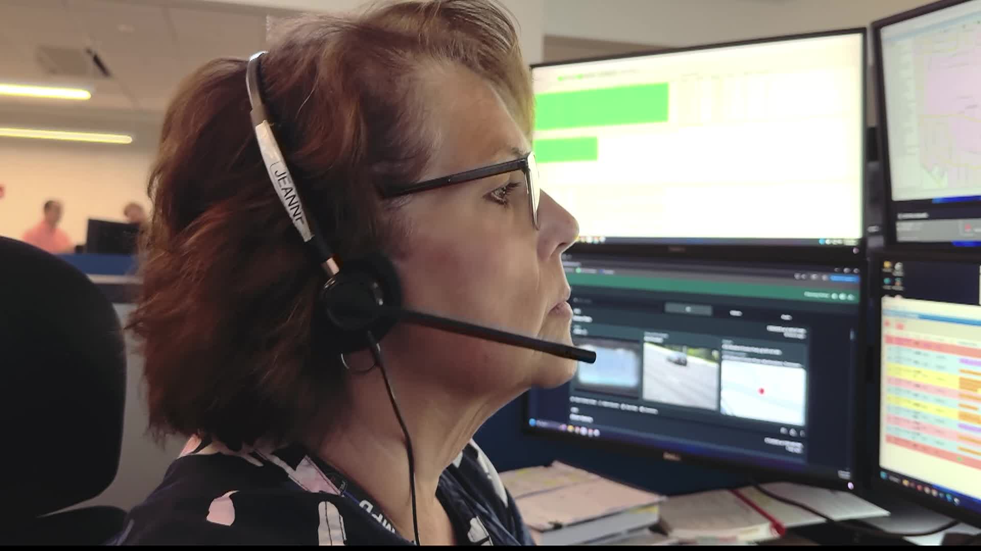 Dispatcher taking an 911 call from a citizen